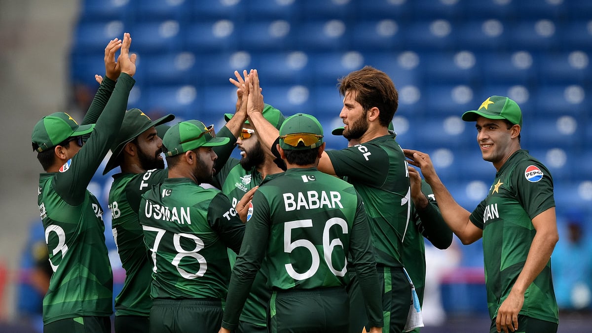 Photo: X/ @TheRealPCB : Pakistan cricket team celebrating after taking a wicket against Ireland in T20 World Cup 2024.